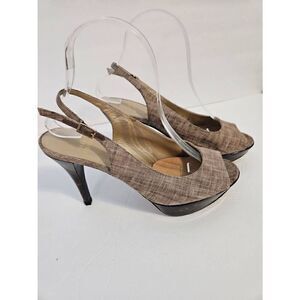 Stuart Weitzman  heathered tan slingback with a unique 4" tortoise shell heel. S